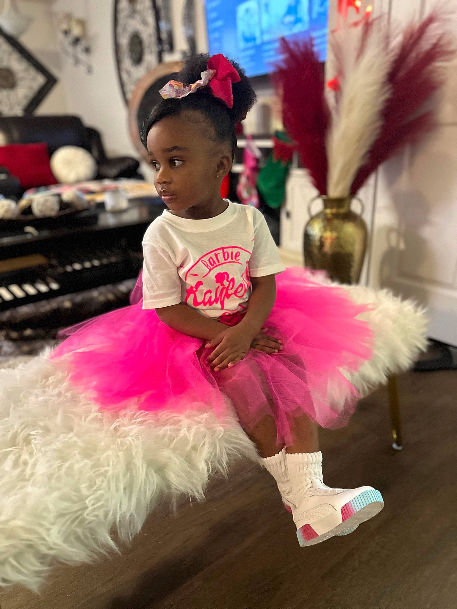 Kayleigh joined the competition — help win amazing prizes! baby_toddler_clothing, ballet_tutu, child, costume, entertainment, event, fashion_design, fun, fur, happy, hat, magenta, performance, performing_arts, person, pink, ruffle, sitting, sportswear, toddler