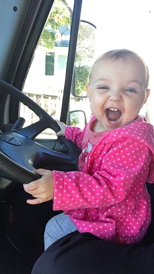 Haley joined the competition — help win amazing prizes! automotive_window_part, baby, baby_toddler_clothing, car_seat, cheek, child, ear, iris, lip, mouth, nose, person, pink, polka_dot, steering_part, steering_wheel, toddler, tongue, tooth, vehicle_door