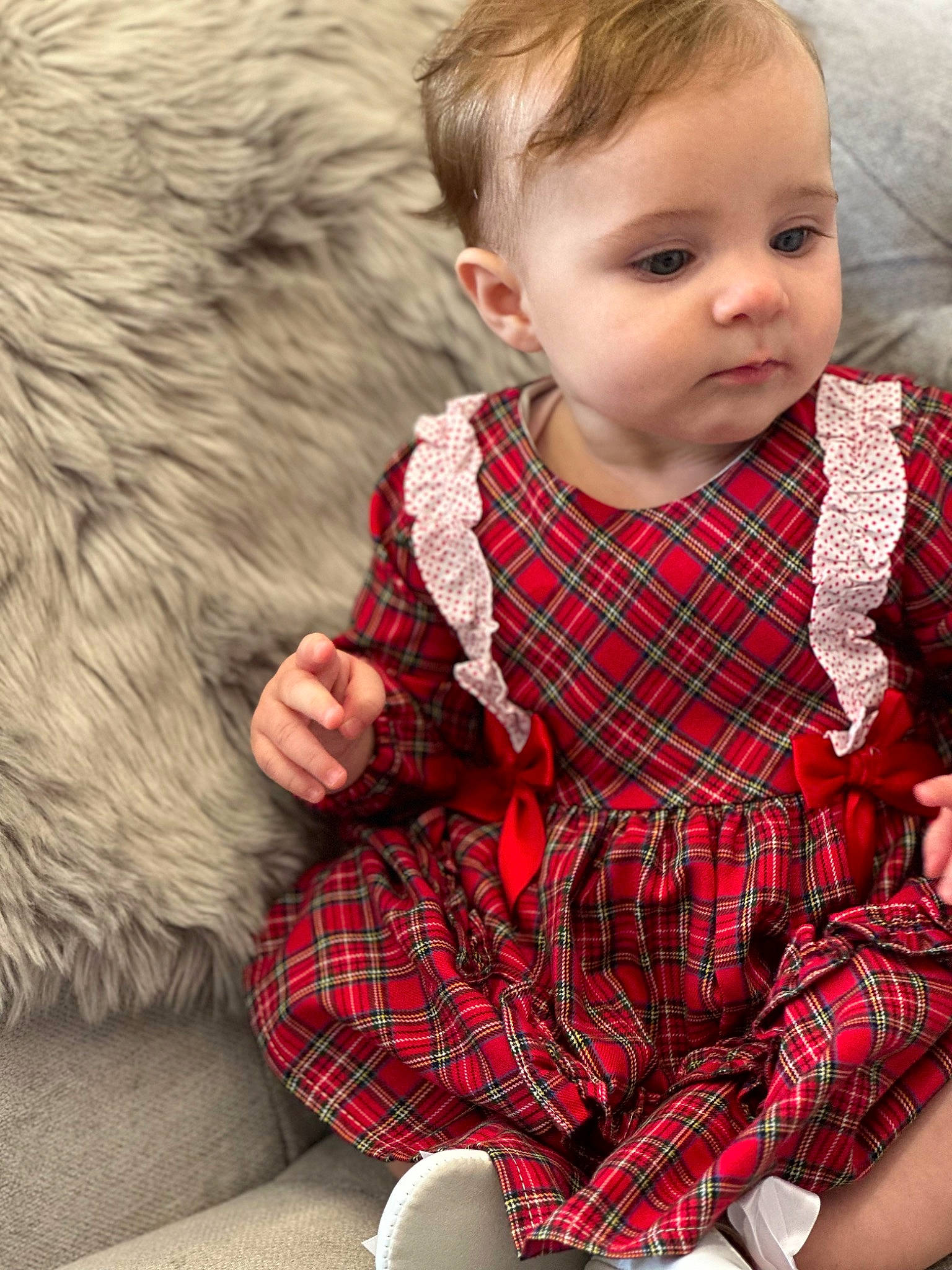 Maggie joined the competition — help win amazing prizes! baby, baby_toddler_clothing, child, collar, dress, face, facial_expression, hair, head, human_body, iris, outerwear, person, plaid, plant, red, skin, sleeve, tartan, textile