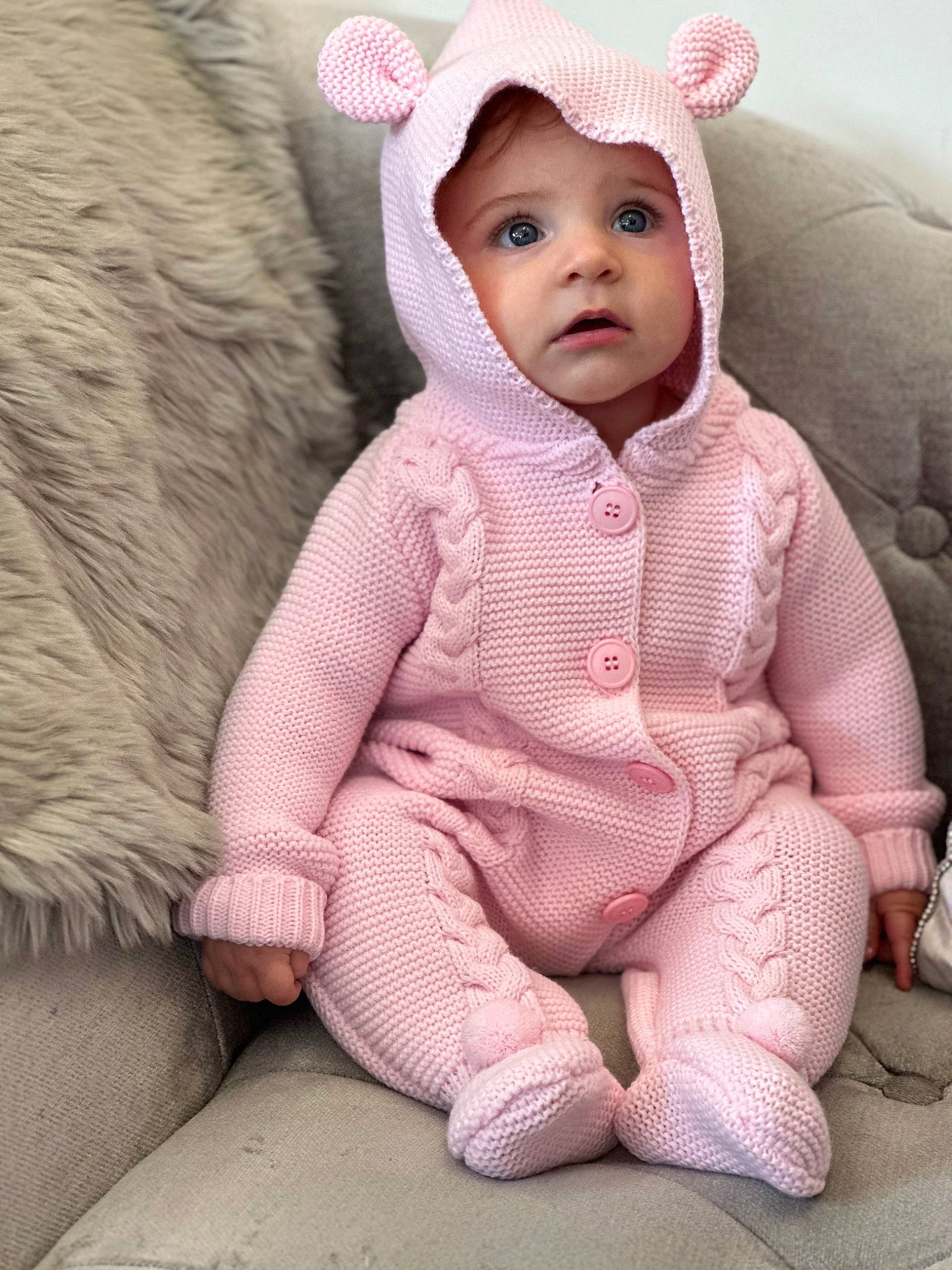 Maggie joined the competition — help win amazing prizes! arm, baby, baby_toddler_clothing, cap, cheek, chin, comfort, eye, eyebrow, face, head, headgear, headwear, lip, nose, person, pink, skin, sleeve, smile
