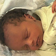 Kenyadi joined the competition — help win amazing prizes! baby, newborn, sleeping, infant, blanket, soft, peaceful, face, skin, clothing, hand, closeup, portrait, indoors, rest, comfort, child, cute, toddler, young