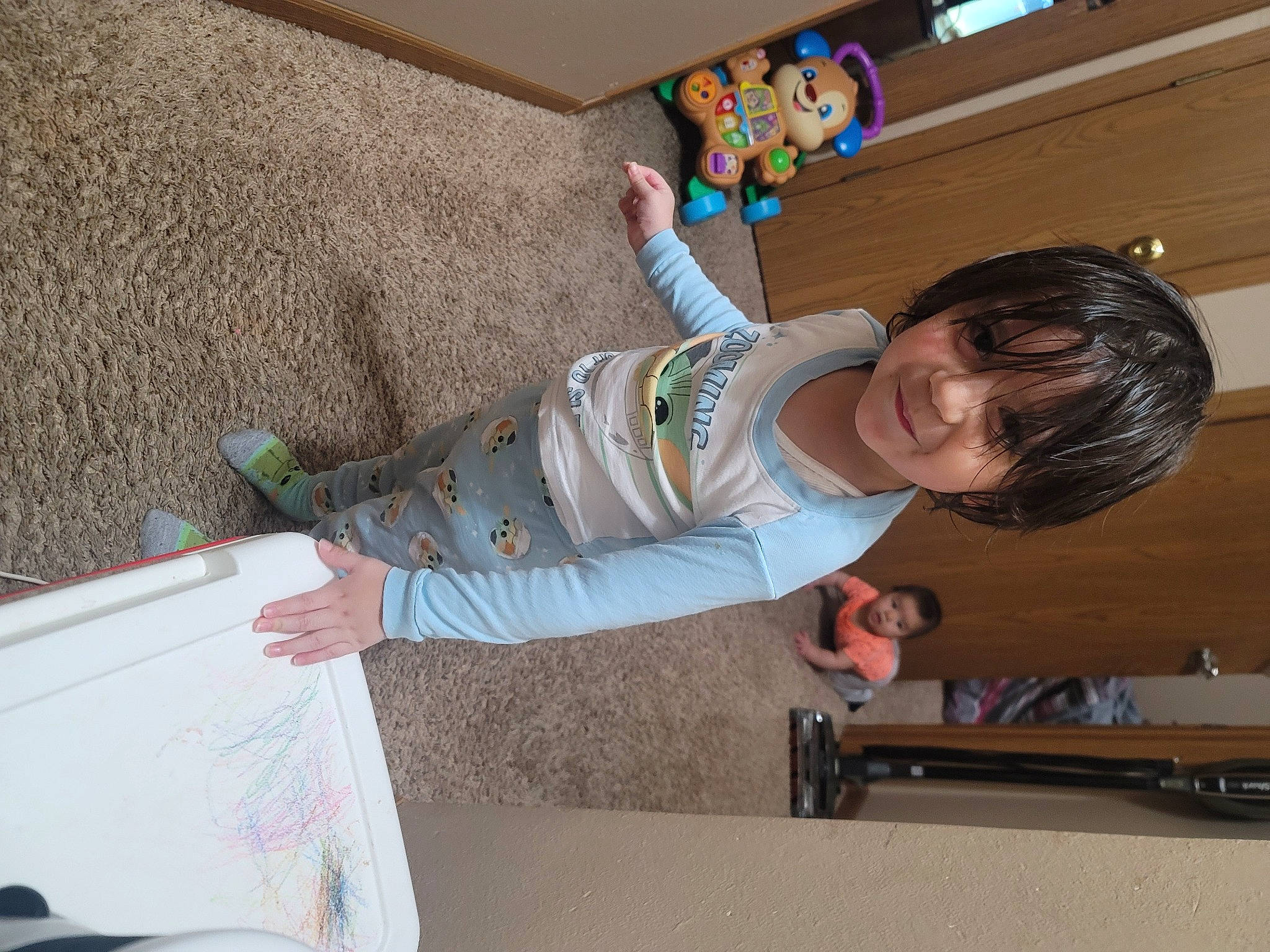 Aaron is registered to the contest to win money with this photo: baby, baby_toddler_clothing, child, drawer, elbow, flooring, fun, happy, hardwood, joint, person, play, room, smile, sock, t_shirt, toddler, wood