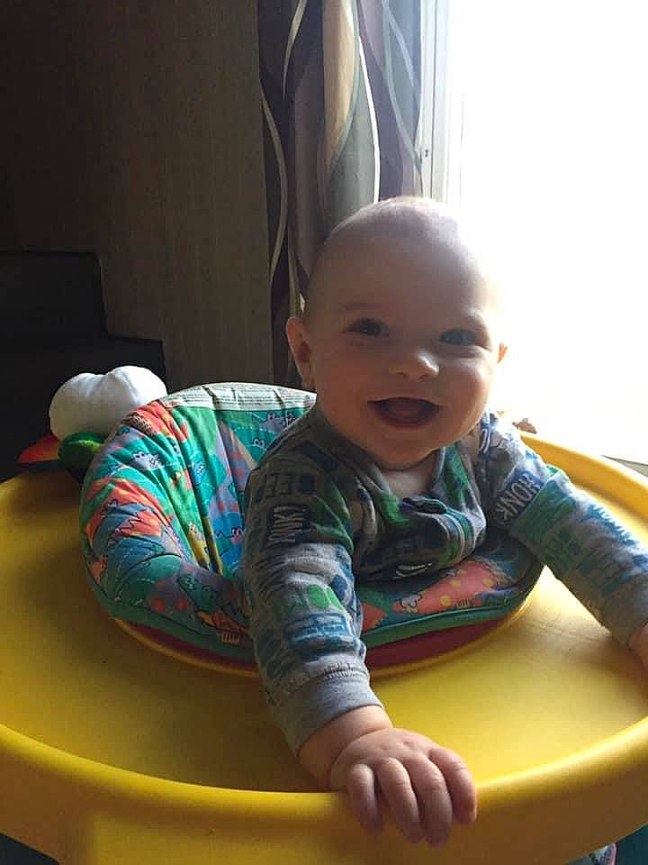 Caleb participe au concours pour gagner de l'argent avec cette photo : baby, baby_toddler_clothing, child, comfort, crawling, curtain, flooring, fun, happy, human_body, leisure, person, plant, play, room, sitting, smile, table, toddler, wood