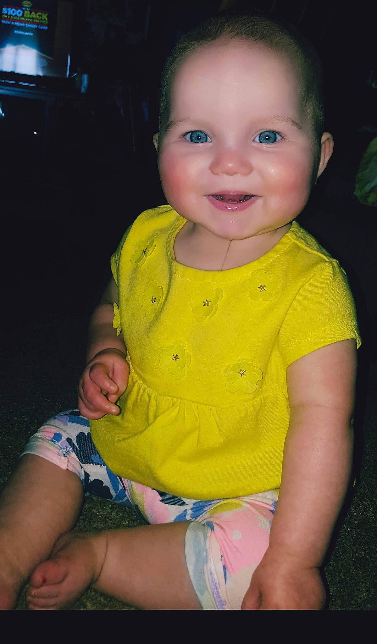 Emmalee joined the competition — help win amazing prizes! baby, beauty, cheek, child, chin, eye, face, fun, head, iris, lip, neck, nose, person, sitting, skin, smile, standing, toddler, yellow