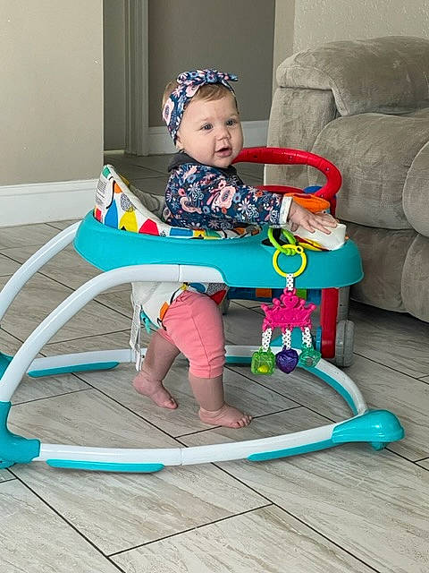 Samarie joined the competition — help win amazing prizes! baby, baby_toddler_clothing, child, comfort, couch, event, fun, leisure, magenta, person, play, sitting, smile, toddler, vacation