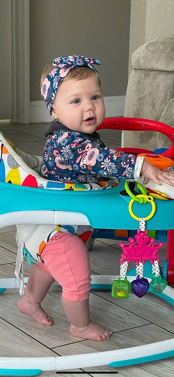 Samarie is registered to the contest to win money with this photo: baby, baby_toddler_clothing, blue, electric_blue, event, fun, green, happy, hat, leisure, magenta, person, photograph, pink, red, sleeve, snapshot, textile, thigh, toddler