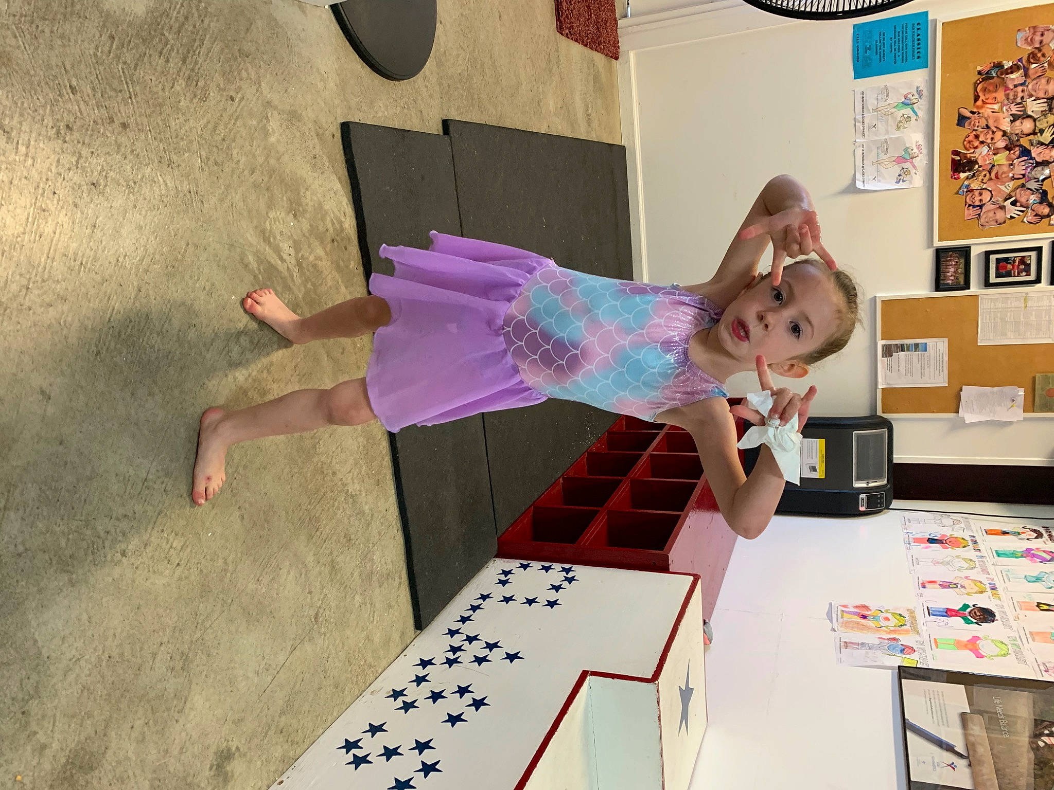 Lizzie is registered to the contest to win money with this photo: animation, art, child, desk, fashion_design, flooring, fun, house, leisure, magenta, person, play, room, table, toddler, visual_arts, wood