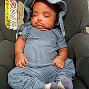 Myles joined the competition — help win amazing prizes! baby, infant, sleeping, blue_clothing, car_seat, hat, sock, child, cute, resting, indoors, seat, warning_label, toddler, small_child, peaceful, portrait, headwear, casual_clothing, comfort