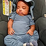 baby, infant, sleeping, blue_clothing, car_seat, hat, sock, child, cute, resting, indoors, seat, warning_label, toddler, small_child, peaceful, portrait, headwear, casual_clothing, comfort