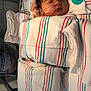 newborn, baby, hospital, medical_tubes, blanket, pacifier, sleeping, infant, neonatal_care, bed, face, person, healthcare, swaddled, cute, resting, child, indoors, patient, care