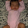 baby, sleeping, infant, pink_onesie, blanket, arm_raised, peaceful, cute, soft_texture, lying_down, newborn, child, relaxation, indoors, cozy, portrait, human, skin, face, closed_eyes
