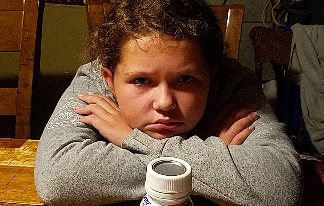 Mauli joined the competition — help win amazing prizes! bored, child, face, forehead, human, lip, mouth, nose, person, sitting