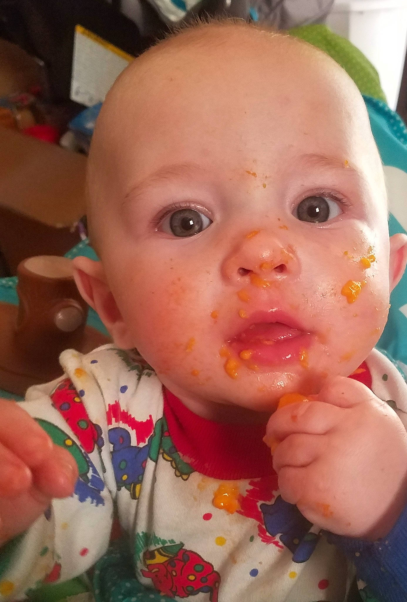 Edgar is registered to the contest to win money with this photo: baby, baby_food, cheek, child, chin, eating, eye, eyebrow, face, finger, forehead, head, iris, lip, mouth, neck, nose, person, skin, thumb