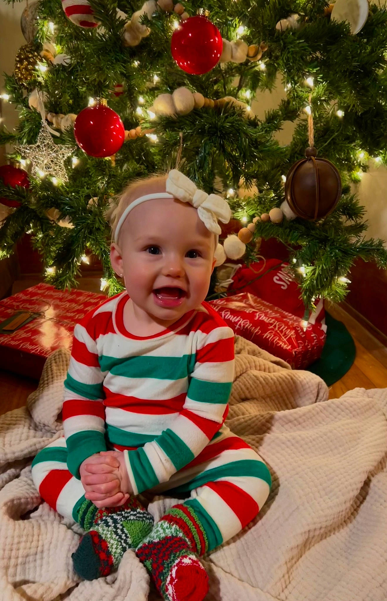 Wren joined the competition — help win amazing prizes! baby, baby_toddler_clothing, christmas, christmas_decoration, christmas_eve, christmas_ornament, christmas_tree, conifer, event, happy, head, headwear, holiday, holiday_ornament, human_body, joy, ornament, person, red, sleeve