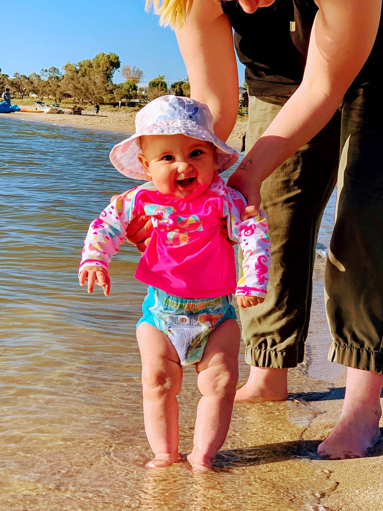 Franchesca is registered to the contest to win money with this photo: baby, barefoot, beach, child, daughter, fun, happy, headwear, leisure, people, person, play, sand, sea, smile, summer, sun_hat, toddler, tourism, vacation