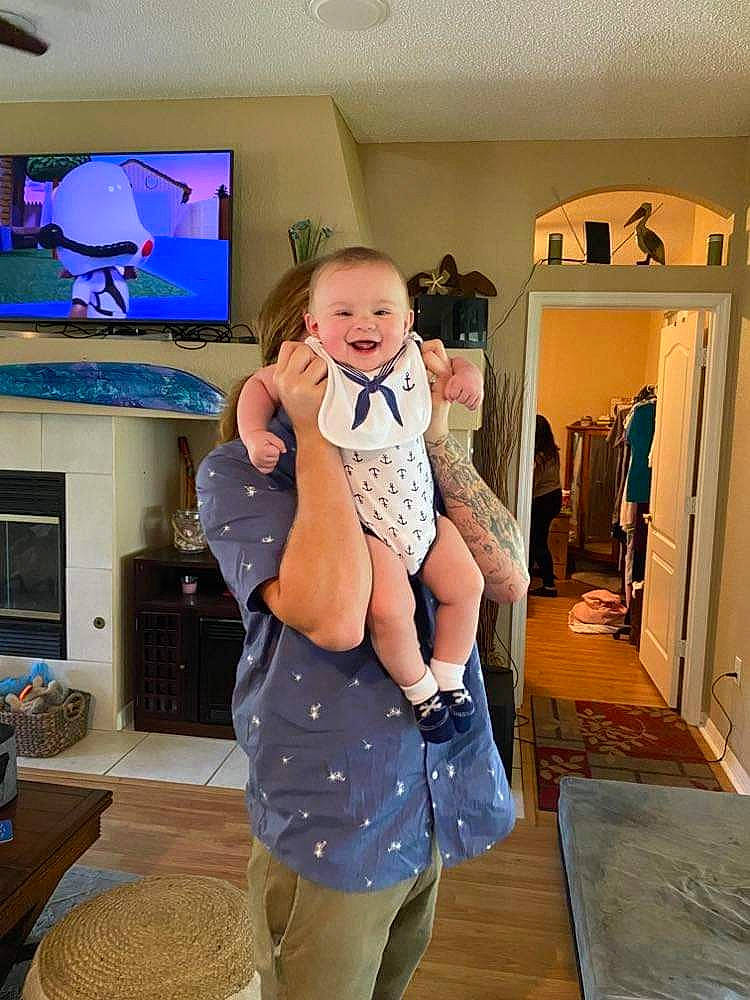 Otis joined the competition — help win amazing prizes! abdomen, child, electric_blue, fashion_design, fun, happy, human_leg, joy, knee, leg, pattern, person, purple, room, sleeve, standing, t_shirt, television, thigh, toddler