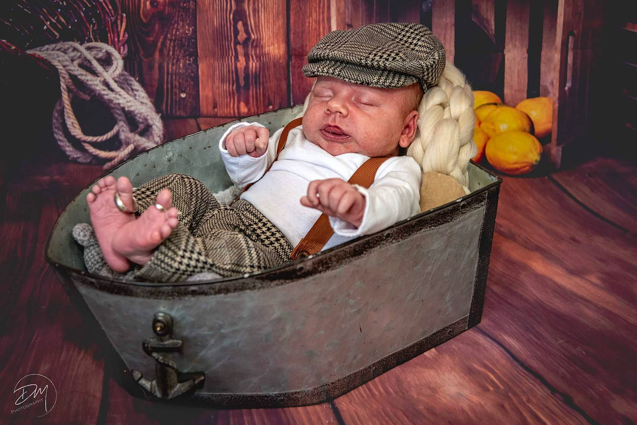 Jesse Ray is registered to the contest to win money with this photo: baby, baby_toddler_clothing, basket, cap, child, comfort, flash_photography, flooring, fun, happy, hardwood, hat, headwear, infant_bed, leisure, person, room, sitting, storage_basket, toddler