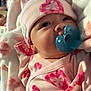 Laylani Dailynn joined the competition — help win amazing prizes! baby, pacifier, pink, heart_pattern, hat, pajamas, blanket, hand, cozy, infant, sleepwear, cute, soft, child, newborn, resting, indoors, portrait, warm, snuggly