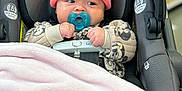 Laylani Dailynn is registered to the contest to win money with this photo: baby, car_seat, pacifier, pink_beanie, blanket, mickey_mouse, clothing, infant, cute, indoor, child, seatbelt, shopping_aisle, soft_toys, warm_clothes, newborn, face, person, comfort, bundle