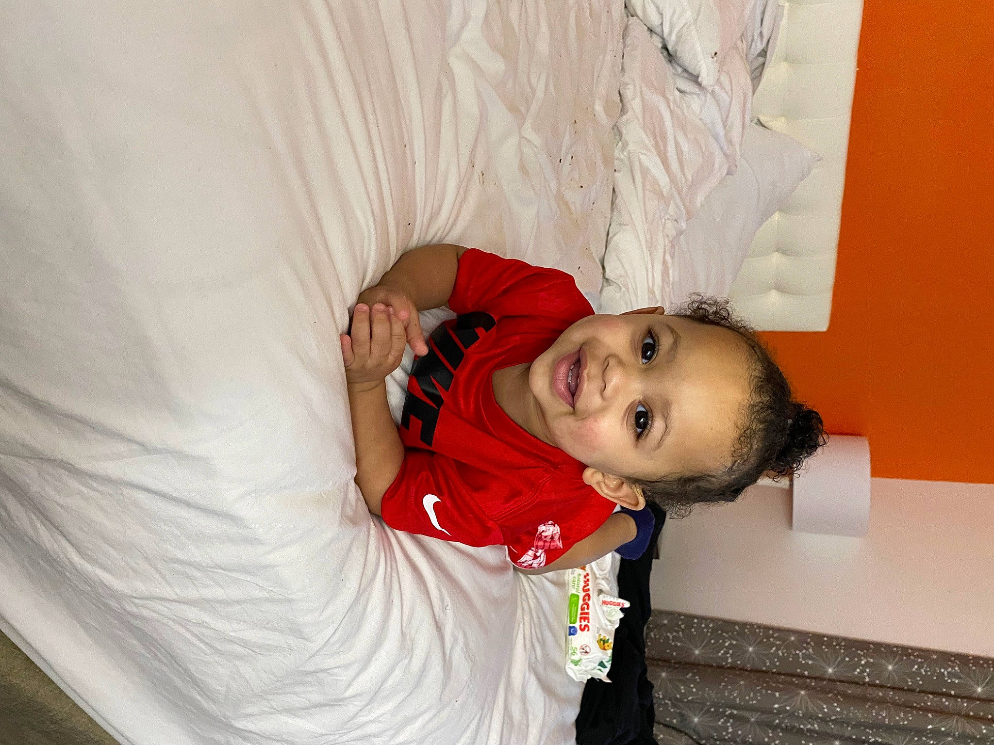 Josiah joined the competition — help win amazing prizes! baby, child, comfort, elbow, fun, happy, joy, linens, mouth, person, room, sleeve, smile, toddler