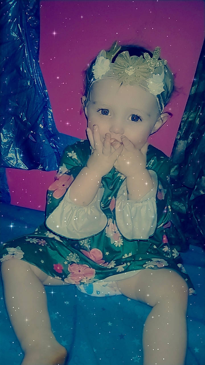 Addalynn joined the competition — help win amazing prizes! baby, baby_toddler_clothing, blue, cheek, child, christmas_eve, electric_blue, eye, fictional_character, fun, happy, human_body, human_leg, ornament, person, pink, sitting, space, thigh, toddler