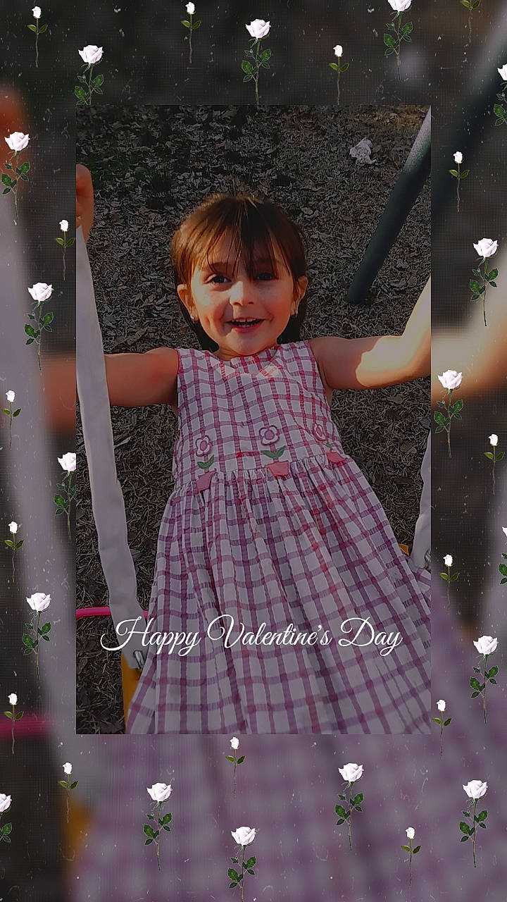 Gabriella is registered to the contest to win money with this photo: baby_toddler_clothing, child, day_dress, facial_expression, flash_photography, formal_wear, fun, gesture, happy, joy, leisure, magenta, pattern, people_in_nature, person, pink, play, purple, smile, standing