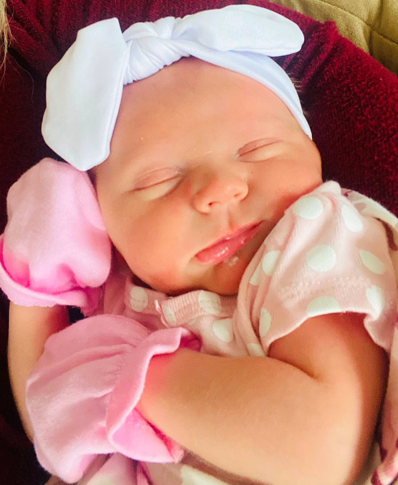 Madelyn is registered to the contest to win money with this photo: baby, baby_products, baby_sleeping, baby_toddler_clothing, cheek, child, comfort, fashion_accessory, finger, happy, linens, lip, mouth, nail, person, pink, product, skin, textile, thumb