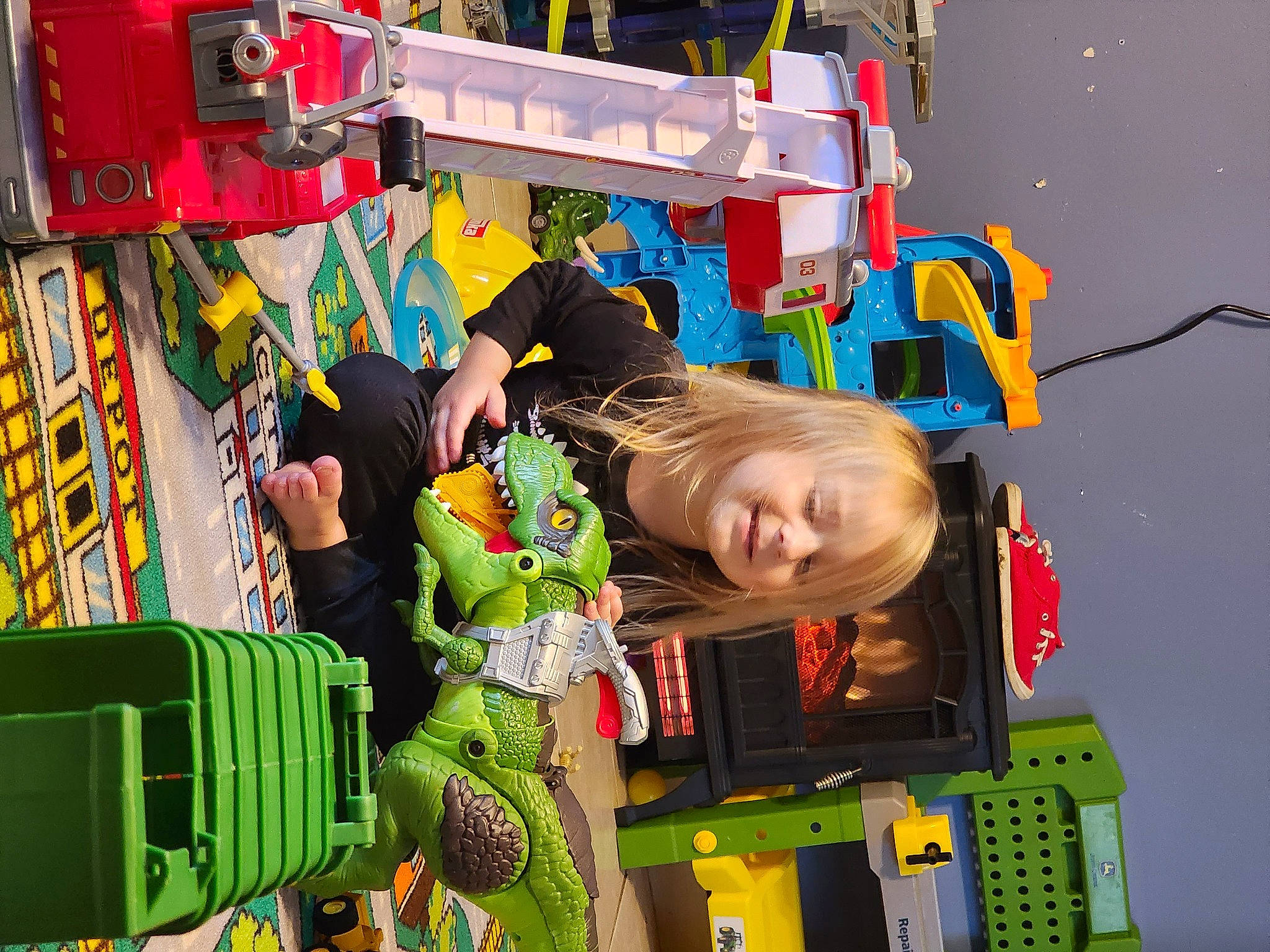 Ezekiel is registered to the contest to win money with this photo: baby, child, engineering, event, fun, green, joy, leisure, machine, motor_vehicle, person, photograph, product, recreation, room, smile, snapshot, technology, tire, toddler