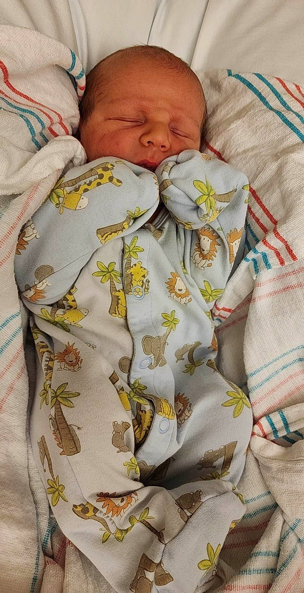 Jensen joined the competition — help win amazing prizes! baby, baby_products, baby_sleeping, baby_toddler_clothing, bed_sheet, bedding, bedtime, button, child, comfort, dress_shirt, human_leg, linens, nap, pattern, person, sleeve, t_shirt, textile, toddler