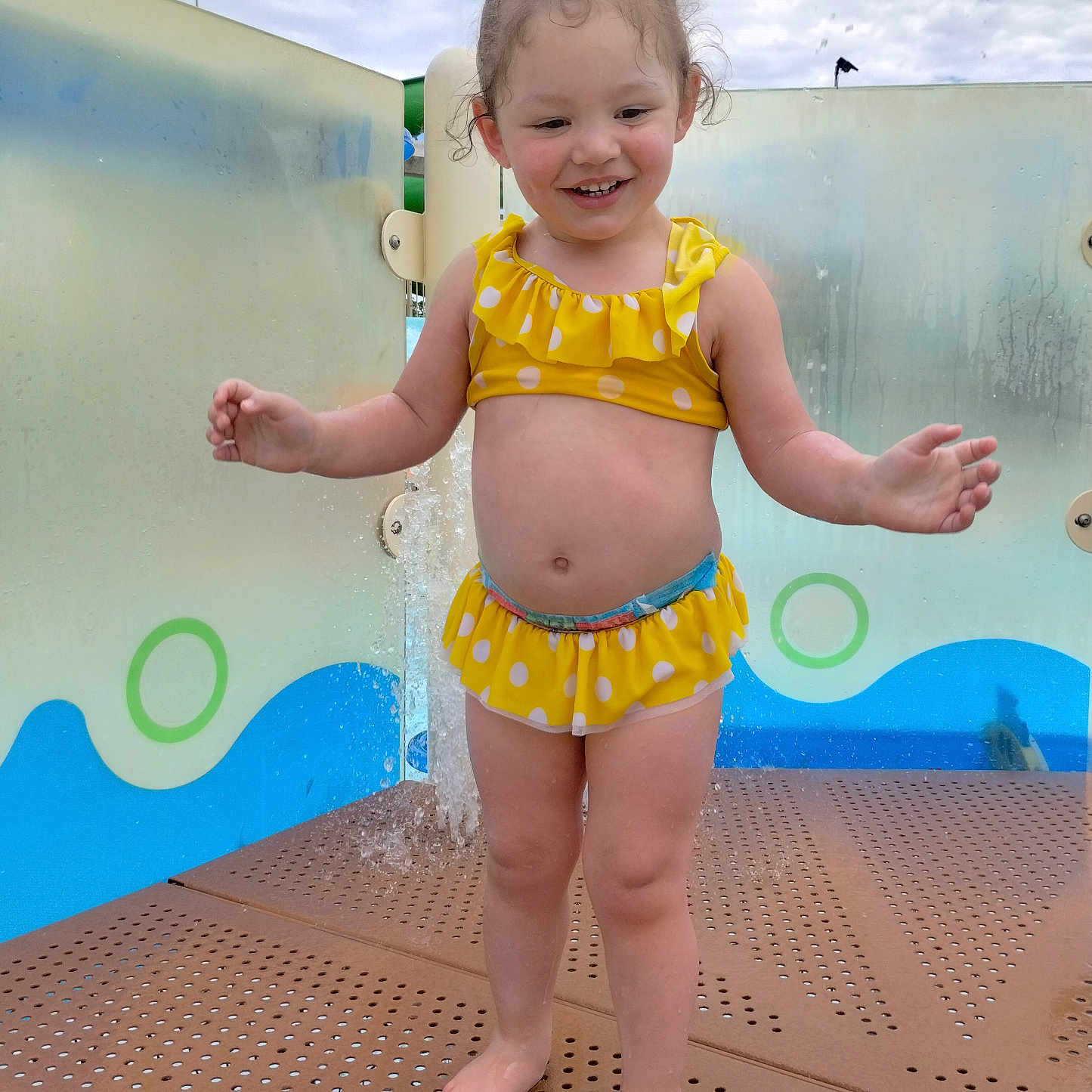 Safiyyah is registered to the contest to win money with this photo: amusementpark, baby, bikini, bodypart, clothing, face, finger, hand, head, outdoors, person, photography, playarea, pool, portrait, shorts, summer, swimwear, water, waterpark