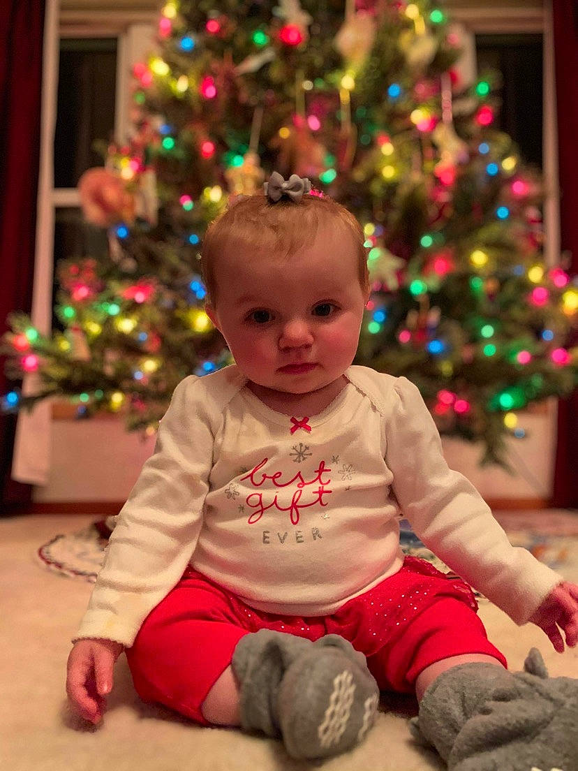 Kinzlee joined the competition — help win amazing prizes! baby, baby_toddler_clothing, cheek, child, christmas, christmas_decoration, christmas_ornament, christmas_tree, event, fun, happy, head, holiday, holiday_ornament, human_body, lap, person, sleeve, toddler, tree
