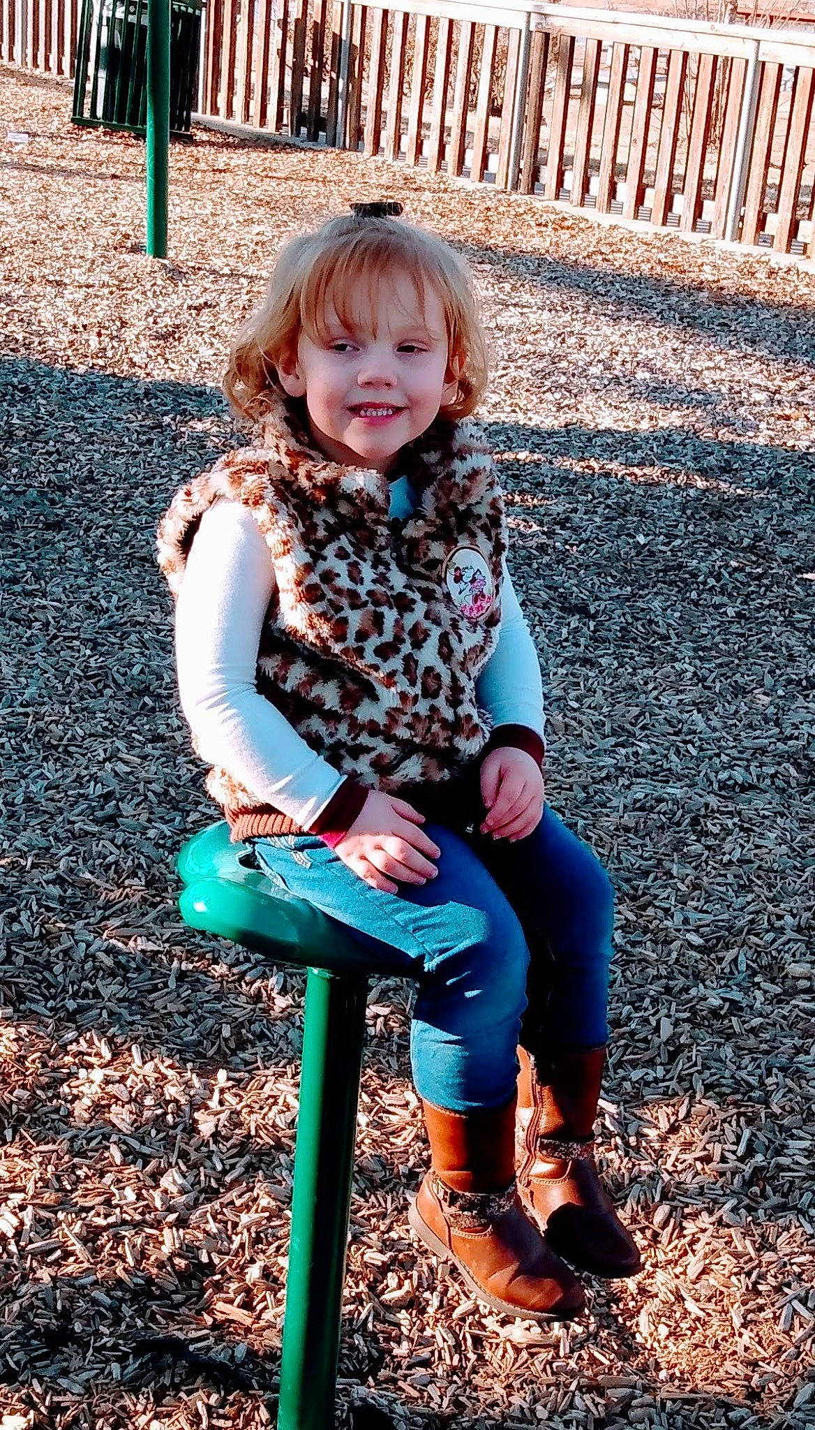 Lily is registered to the contest to win money with this photo: child, fun, grass, hair, hairstyle, happy, joy, knee, leaf, leg, leisure, people_in_nature, person, photograph, playground, public_space, sandal, shoe, smile, sneakers