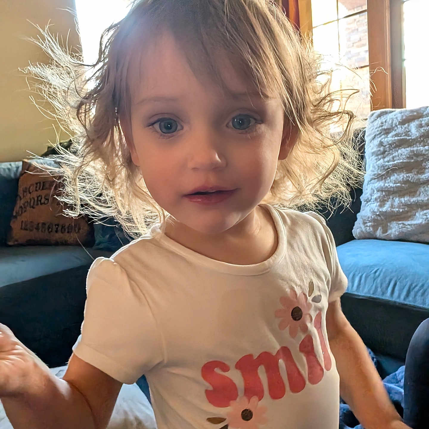 Reina joined the competition — help win amazing prizes! architecture, bodypart, building, child, clothing, couch, cushion, face, female, furniture, girl, head, homedecor, indoors, livingroom, person, photography, portrait, room, t_shirt