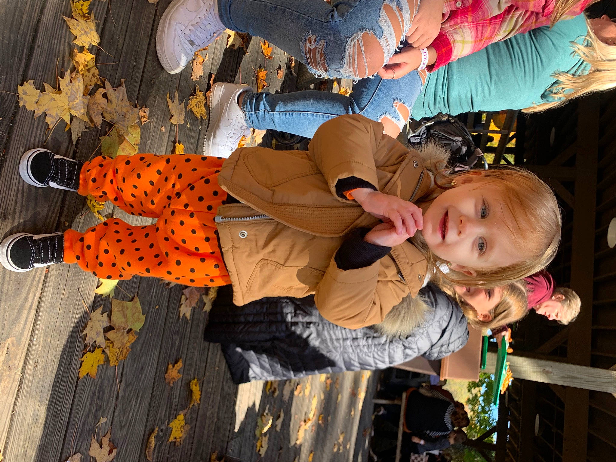 Carmella joined the competition — help win amazing prizes! boot, child, event, fashion, fun, happy, hat, leisure, orange, pattern, person, plant, temple, toddler, travel, tree, vacation, walking_shoe, world