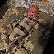 Drew joined the competition — help win amazing prizes! baby, crib, blanket, onesie, patterned, infant, sleeping_area, soft_toys, face, head, clothing, indoors, baby_bed, comfort, resting, child, person, baby_sleepwear, warm, cozy