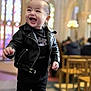 Jared- Matthew Ramos participe au concours pour gagner de l'argent avec cette photo : toddler, child, leather_jacket, black_clothing, white_sneakers, indoor, cathedral, stained_glass, chairs, smiling, happy, walking, portrait, person, fashion, young_child, cute, background_blur, daylight, casual