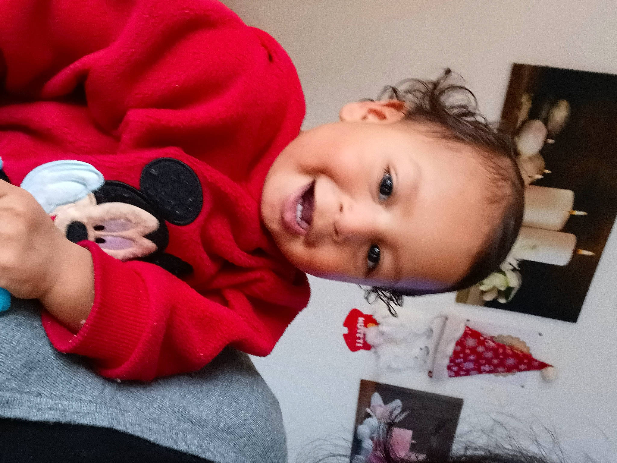 Nolan participe au concours pour gagner de l'argent avec cette photo : baby, baby_toddler_clothing, carmine, cheek, child, christmas, comfort, eyelash, finger, fun, happy, joy, lip, nose, person, picture_frame, room, sitting, skin, sleeve