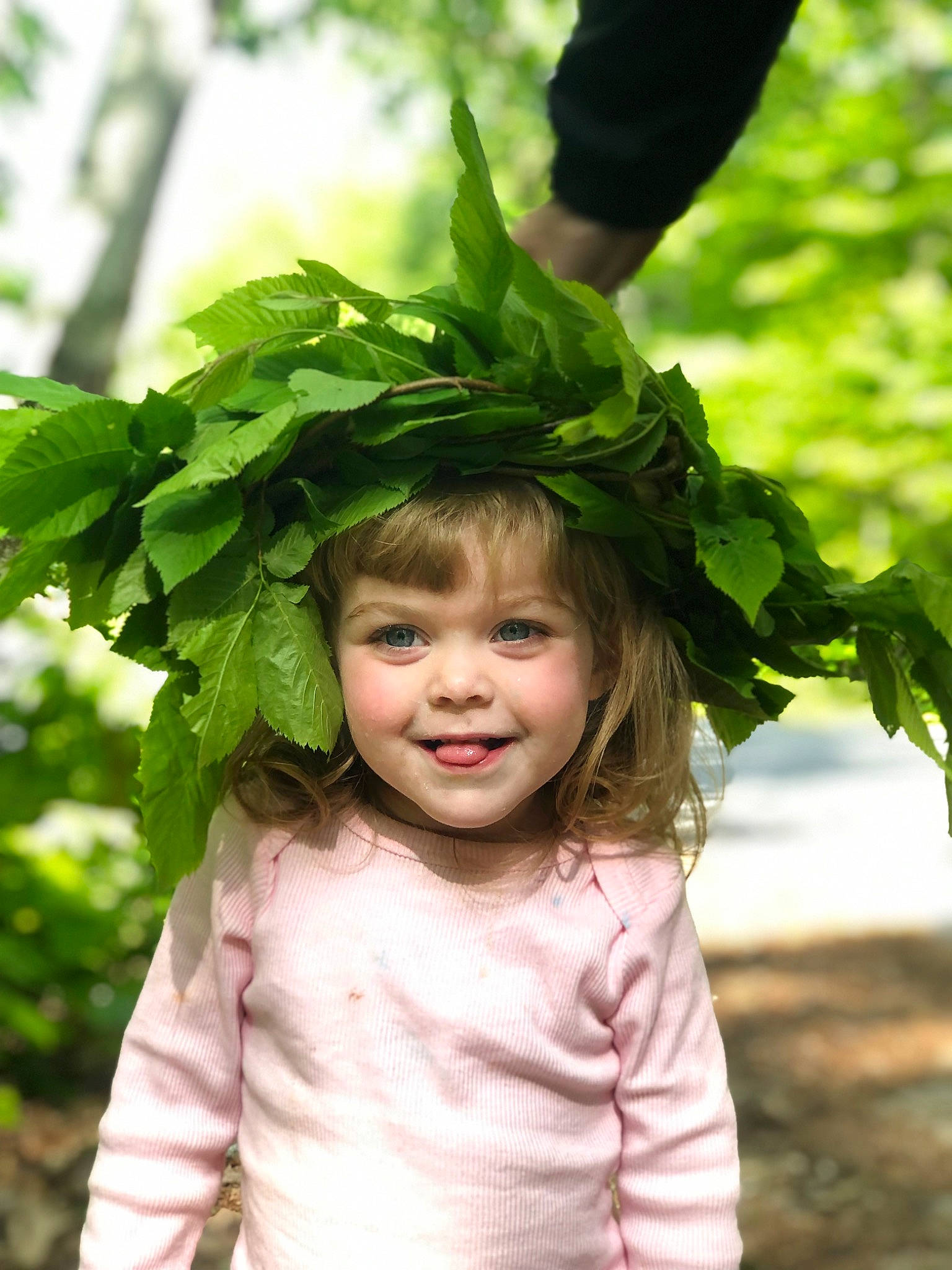 Lailani is registered to the contest to win money with this photo: baby_toddler_clothing, botany, child, flowering_plant, fun, grass, happy, joy, laugh, leaf, leaf_vegetable, natural_foods, people_in_nature, person, portrait_photography, produce, sleeve, smile, spring, sunlight