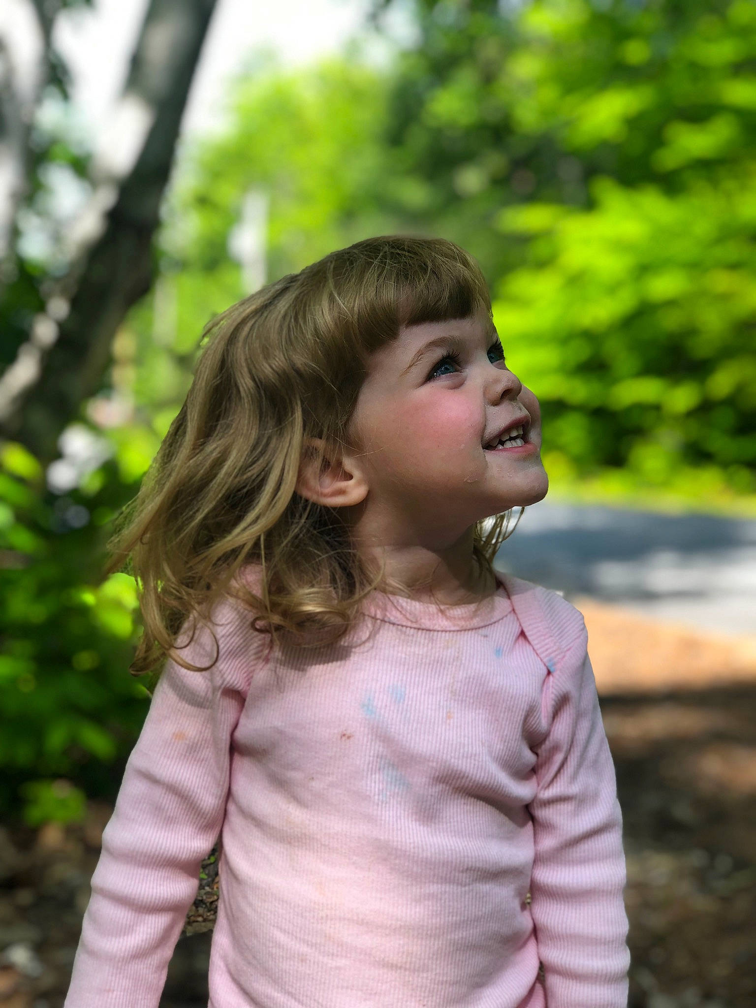 Lailani joined the competition — help win amazing prizes! blond, chin, fun, grass, hair, happy, head, joy, leisure, lip, people_in_nature, person, plant, shoulder, sitting, sleeve, smile, sunlight, t_shirt, toddler