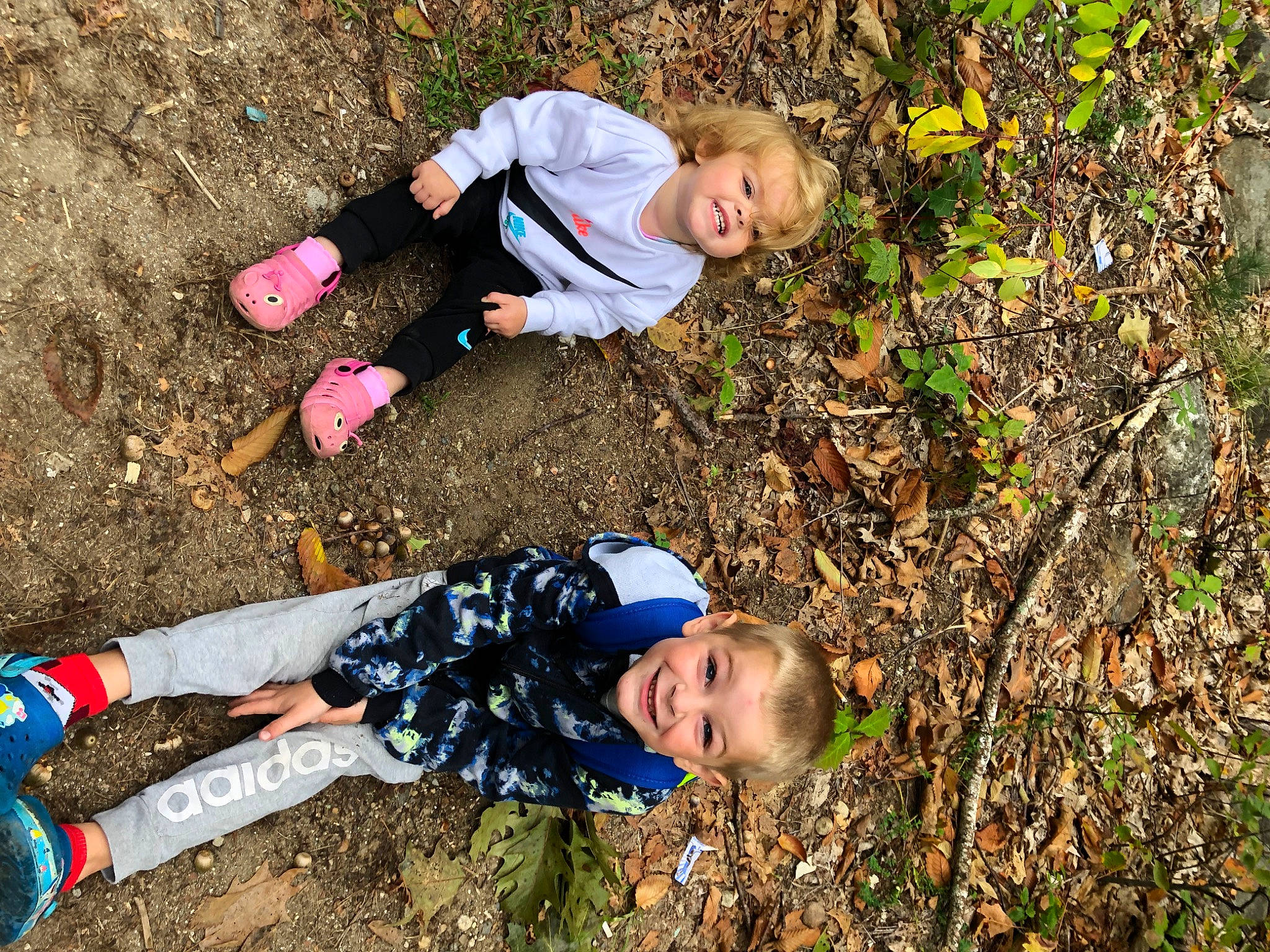 Carter is registered to the contest to win money with this photo: adventure, asphalt, baby_toddler_clothing, child, face, fun, gesture, grass, happy, joy, landscape, leaf, leisure, people_in_nature, person, plant, play, recreation, smile, soil