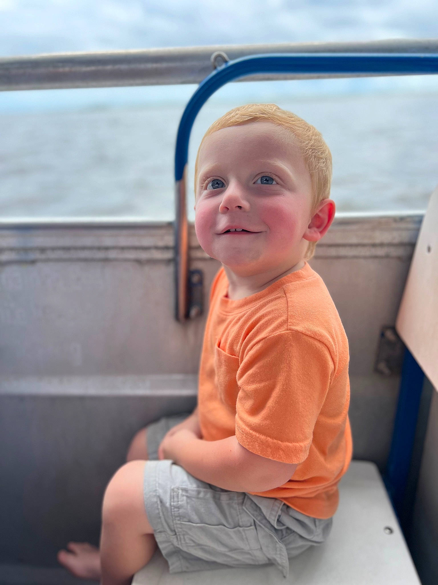 Easton joined the competition — help win amazing prizes! baby, baby_toddler_clothing, cheek, child, chin, cloud, face, flash_photography, fun, happy, lake, leisure, person, shorts, sitting, skin, sky, sleeve, smile, t_shirt
