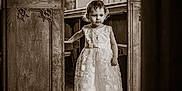 Skylar-Rose joined the competition — help win amazing prizes! architecture, child, church, cross_necklace, curly_hair, decorative, dress, girl, interior, light, portrait, religious, sepia, solemn, standing, stone_floor, vintage, window, wooden_pews, young