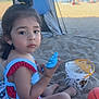child, girl, beach, sand, swimsuit, toy, bucket, tent, summer, outdoor, playing, watermelon_pattern, basketball, sand_toy, toddler, sunny, vacation, relaxation, cute, holiday