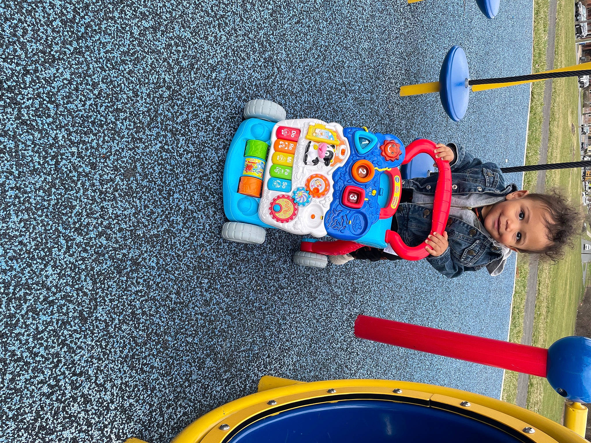 Skyler-ray joined the competition — help win amazing prizes! asphalt, automotive_exterior, automotive_tire, automotive_wheel_system, baby_products, baby_toys, blue, child, electric_blue, fun, joy, leisure, motor_vehicle, person, play, recreation, road_surface, skateboard, toddler, toy