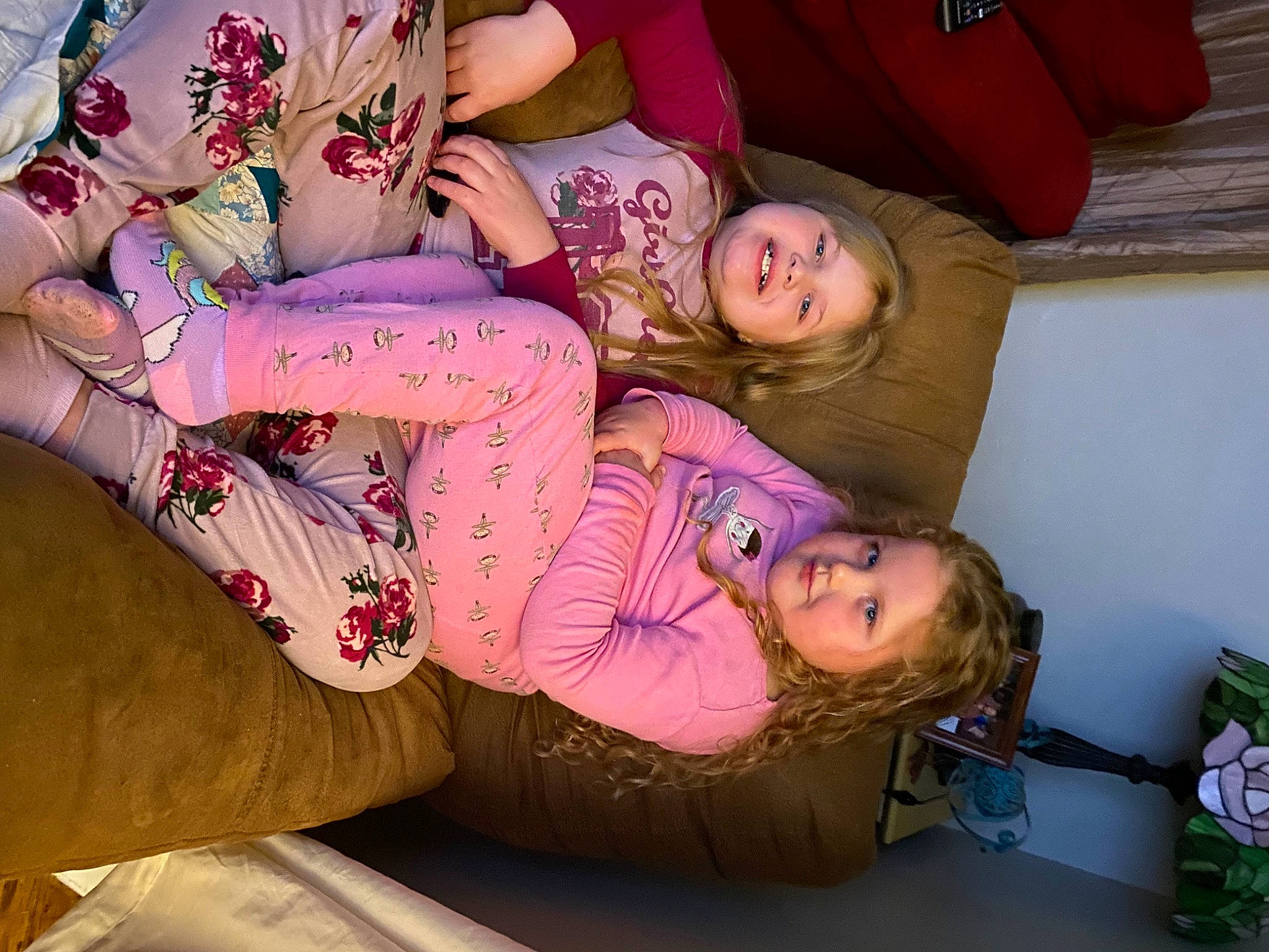 Kensington joined the competition — help win amazing prizes! abdomen, child, comfort, couch, elbow, facial_expression, fun, happy, human_body, human_leg, joy, knee, lap, long_hair, mouth, person, pink, sitting, smile, thigh