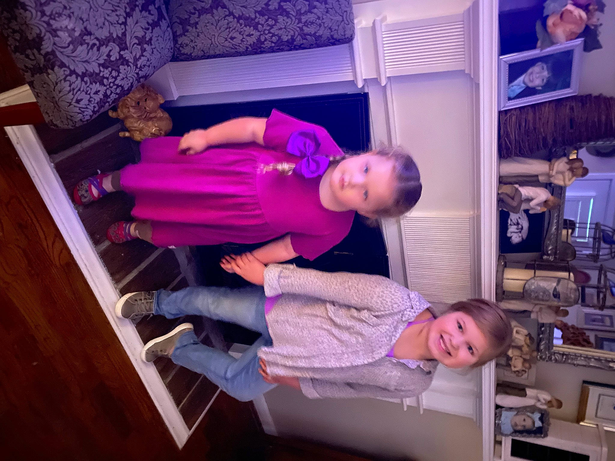 Anniston is registered to the contest to win money with this photo: baby_toddler_clothing, child, comfort, flooring, fun, hardwood, joy, machine, magenta, person, product, purple, room, smile, toddler, violet, wood