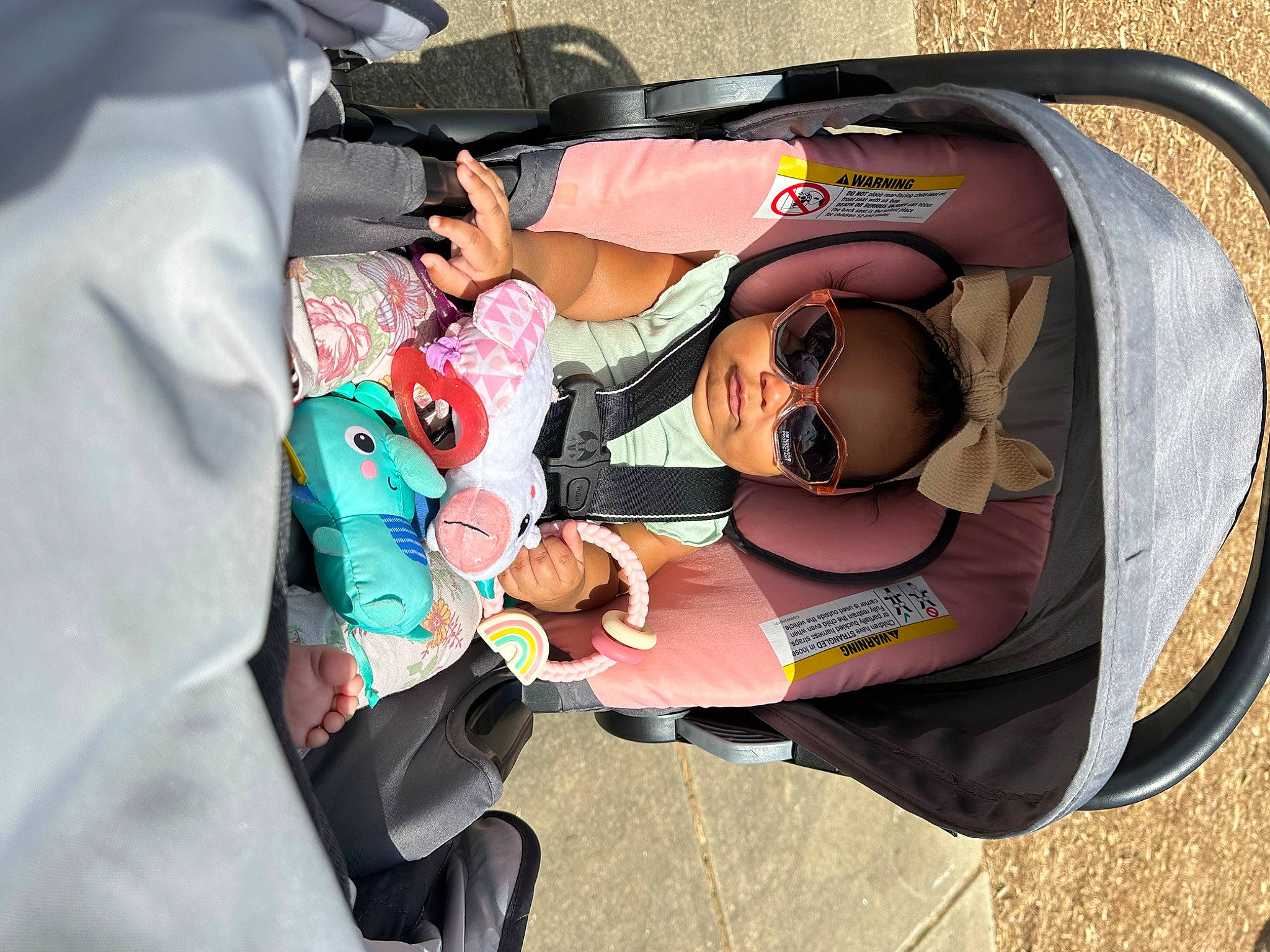 Harmoni is registered to the contest to win money with this photo: baby_carriage, baby_products, bag, baggage, car_seat, child, comfort, fashion_accessory, luggage_and_bags, pattern, person, sitting, toddler, wrist