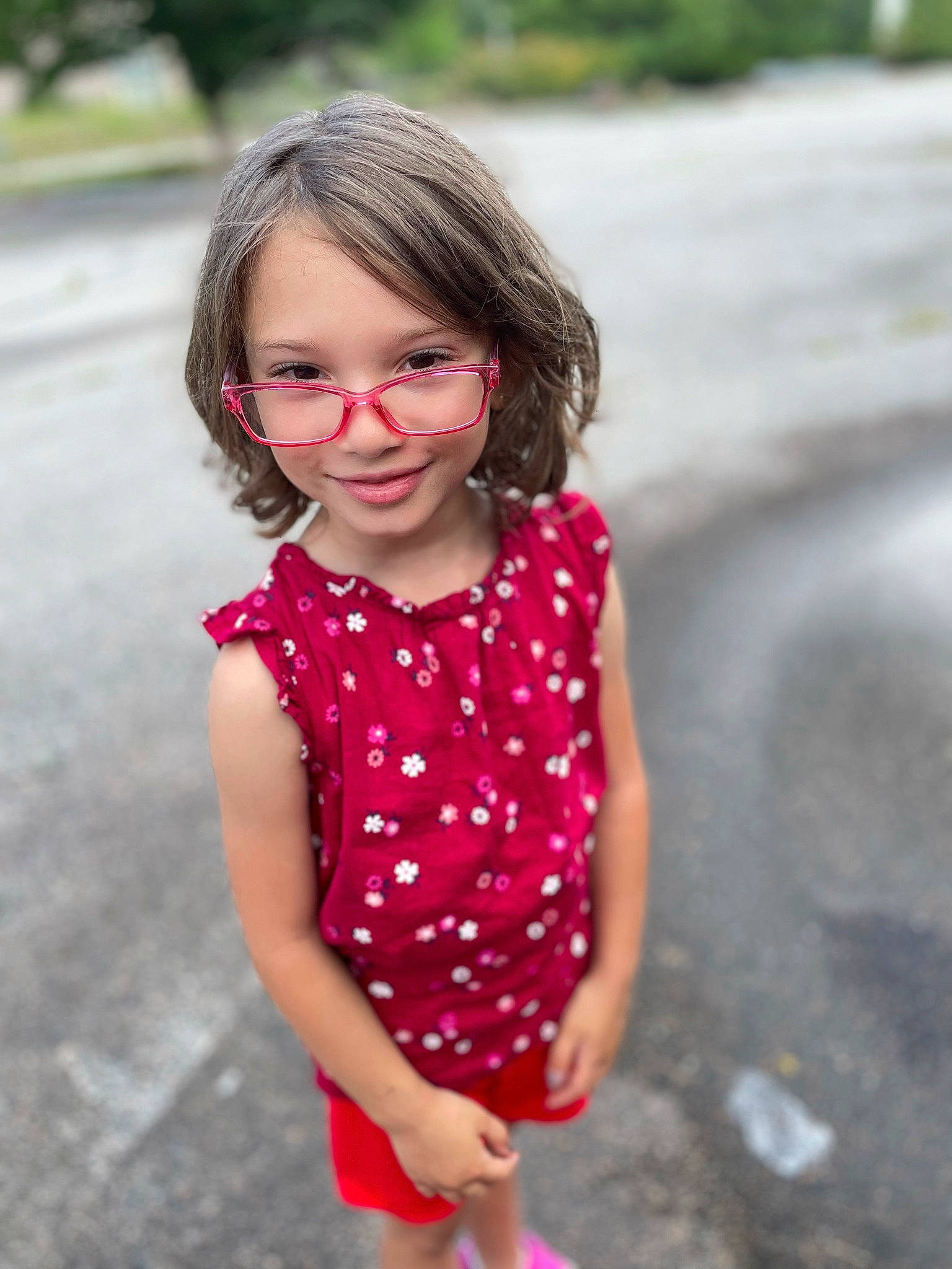 Zoey joined the competition — help win amazing prizes! dress, eye, face, gesture, glasses, grass, hair, hairstyle, happy, head, joy, lip, one_piece_garment, outerwear, person, pink, plant, shoulder, skin, sleeve