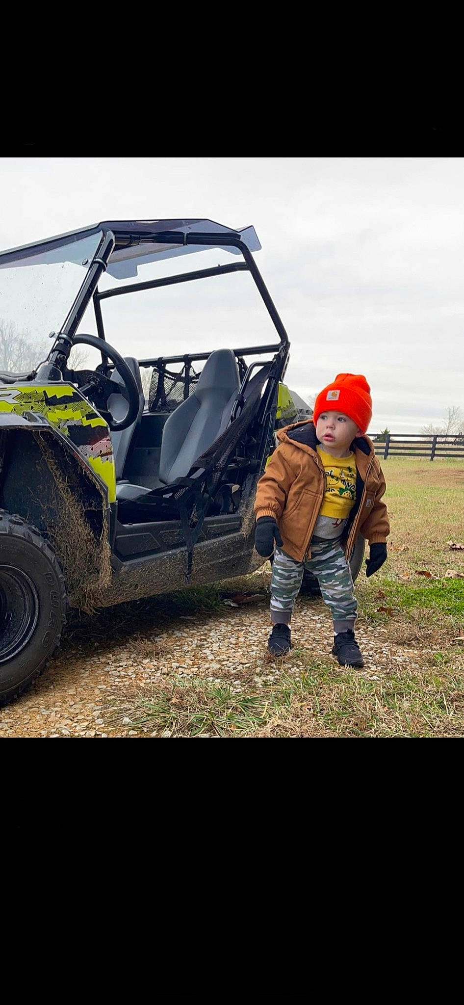 Pierre is registered to the contest to win money with this photo: asphalt, automotive_design, automotive_exterior, automotive_tire, bumper, car, fender, grass, headwear, hood, motor_vehicle, person, recreation, rim, rolling, sky, tire, tread, vehicle, vehicle_door