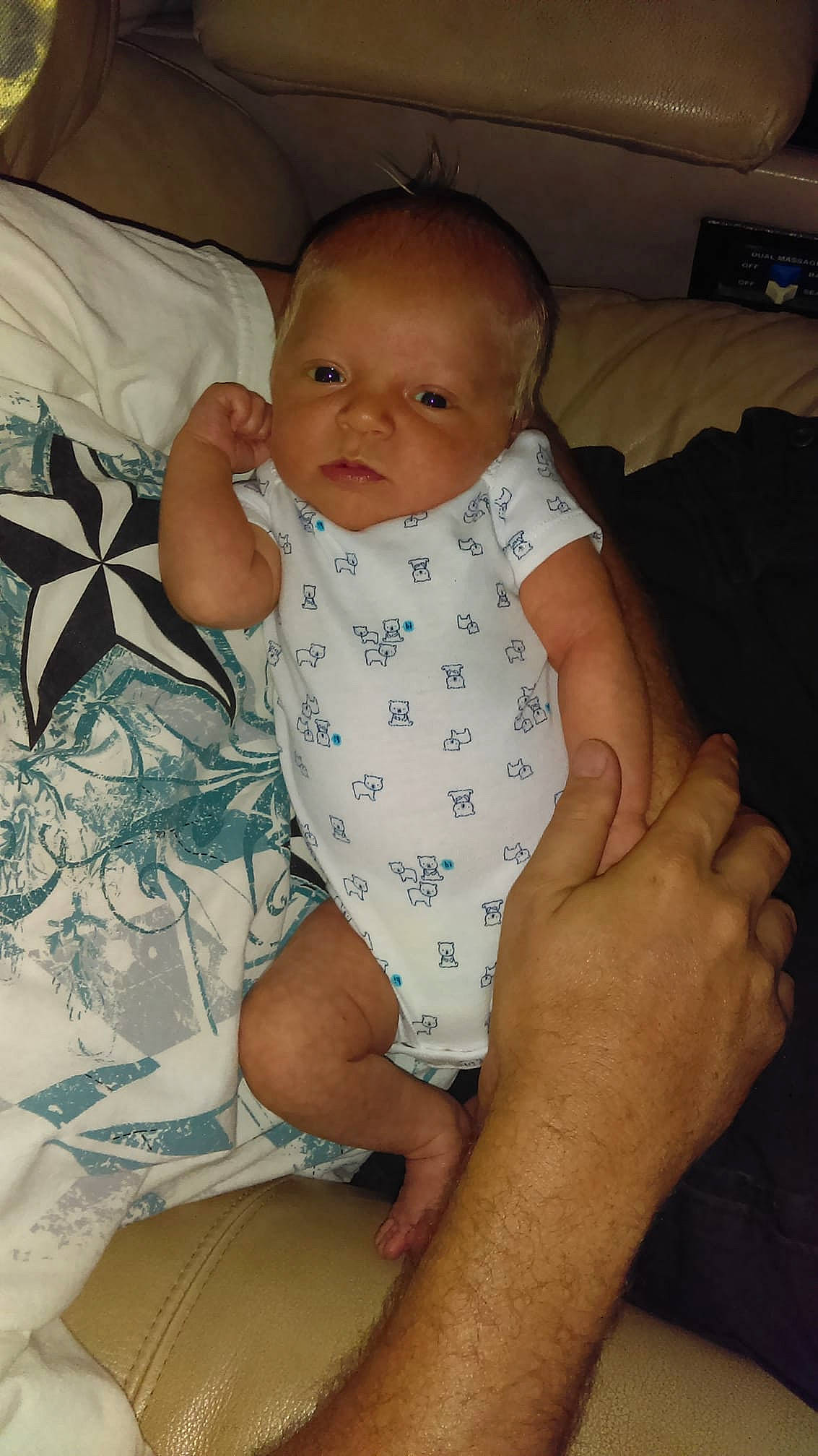 Keith is registered to the contest to win money with this photo: abdomen, arm, boy, cheek, child, day, eye, face, finger, hand, head, infant, leg, mouth, nose, person, sitting, skin, smile, toddler